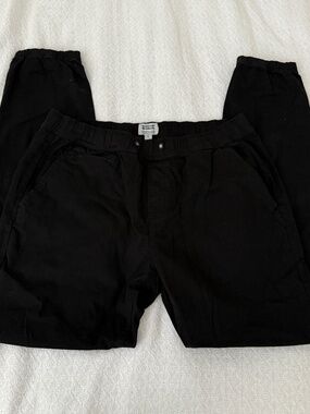 stretchy black pants  size large  details: -no flaws  -elastic waist  -color: bl
